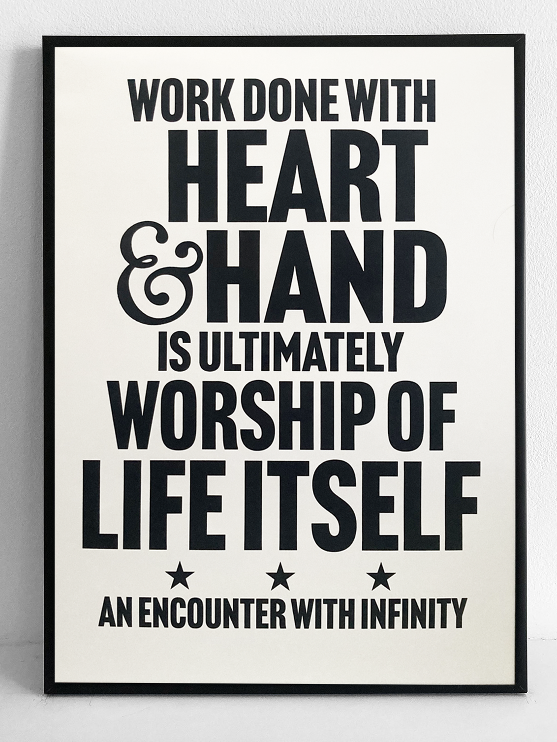 Work done with heart and hand is ultimately worship of life itself. An encounter with infinity. Black text on white background.